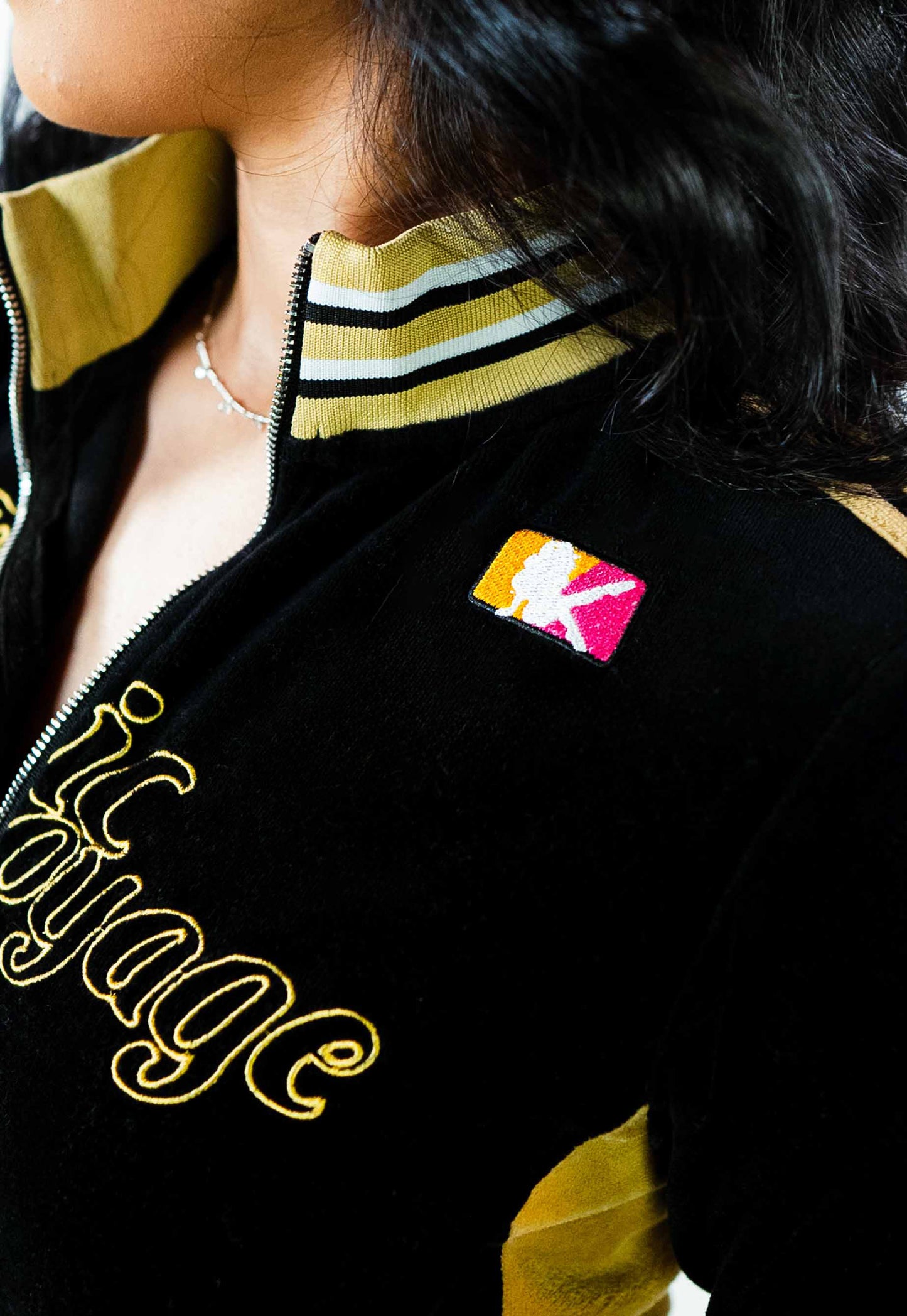 Female Players black velour tracksuit