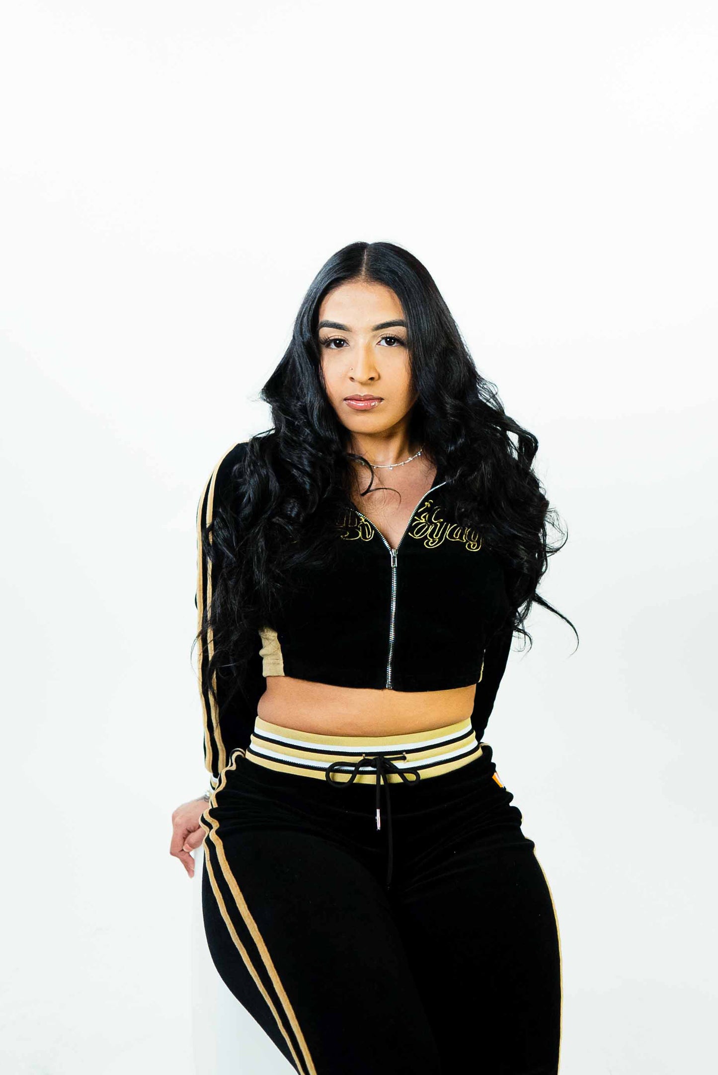 Female Players black velour tracksuit